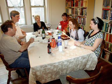 Regie blowing the candles out on her b-day cake. DSC06139.jpg